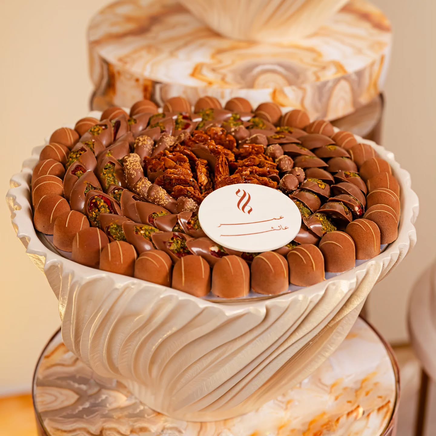 luxurious single-tray wedding display by Fa Le Bon Chocolatier, artfully arranged with handcrafted chocolates, chocolate-covered fresh fruit, cookies, and colorful macarons for elegant celebrations and luxury gifting