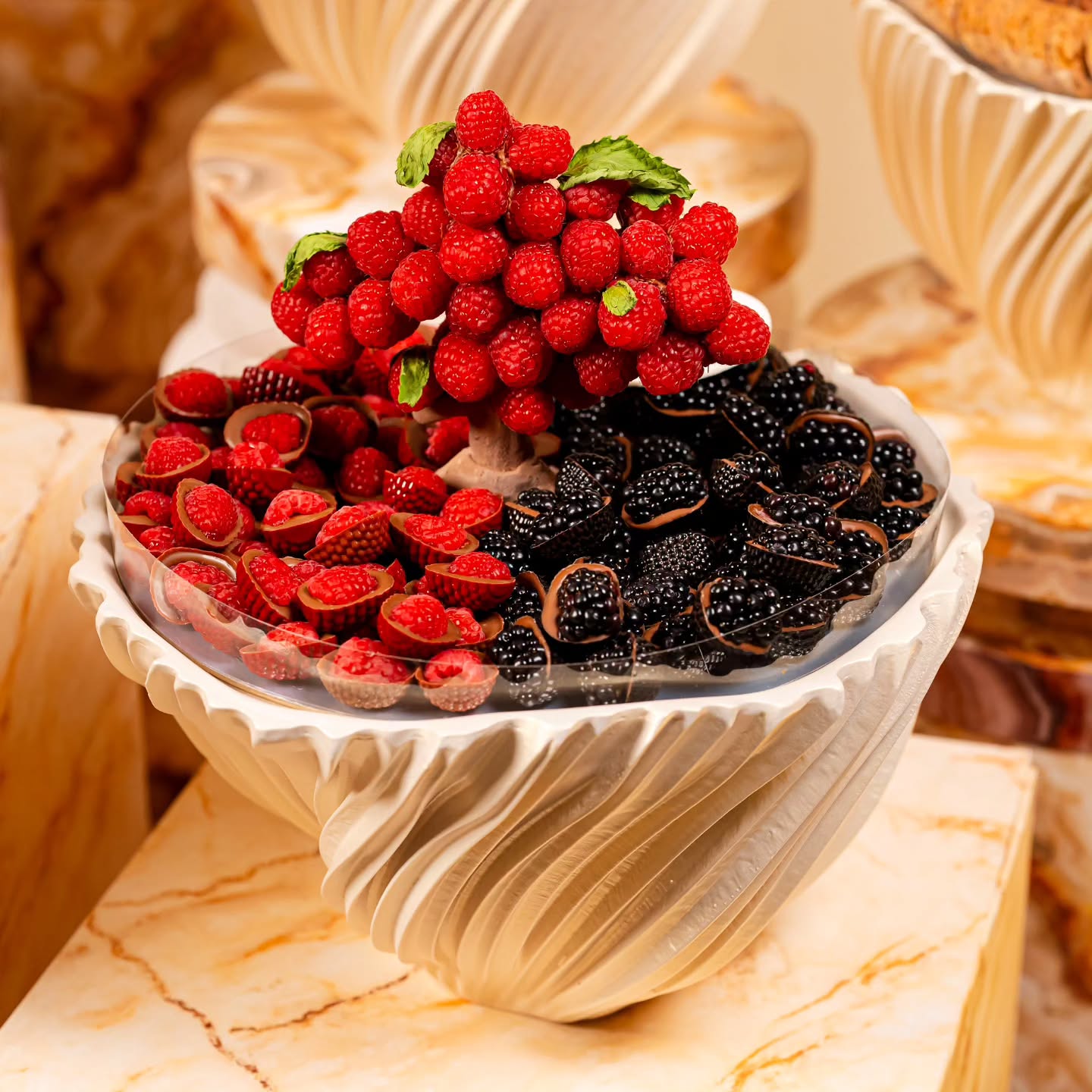 luxurious single-tray wedding display by Fa Le Bon Chocolatier, artfully arranged with handcrafted chocolates, chocolate-covered fresh fruit, cookies, and colorful macarons for elegant celebrations and luxury gifting