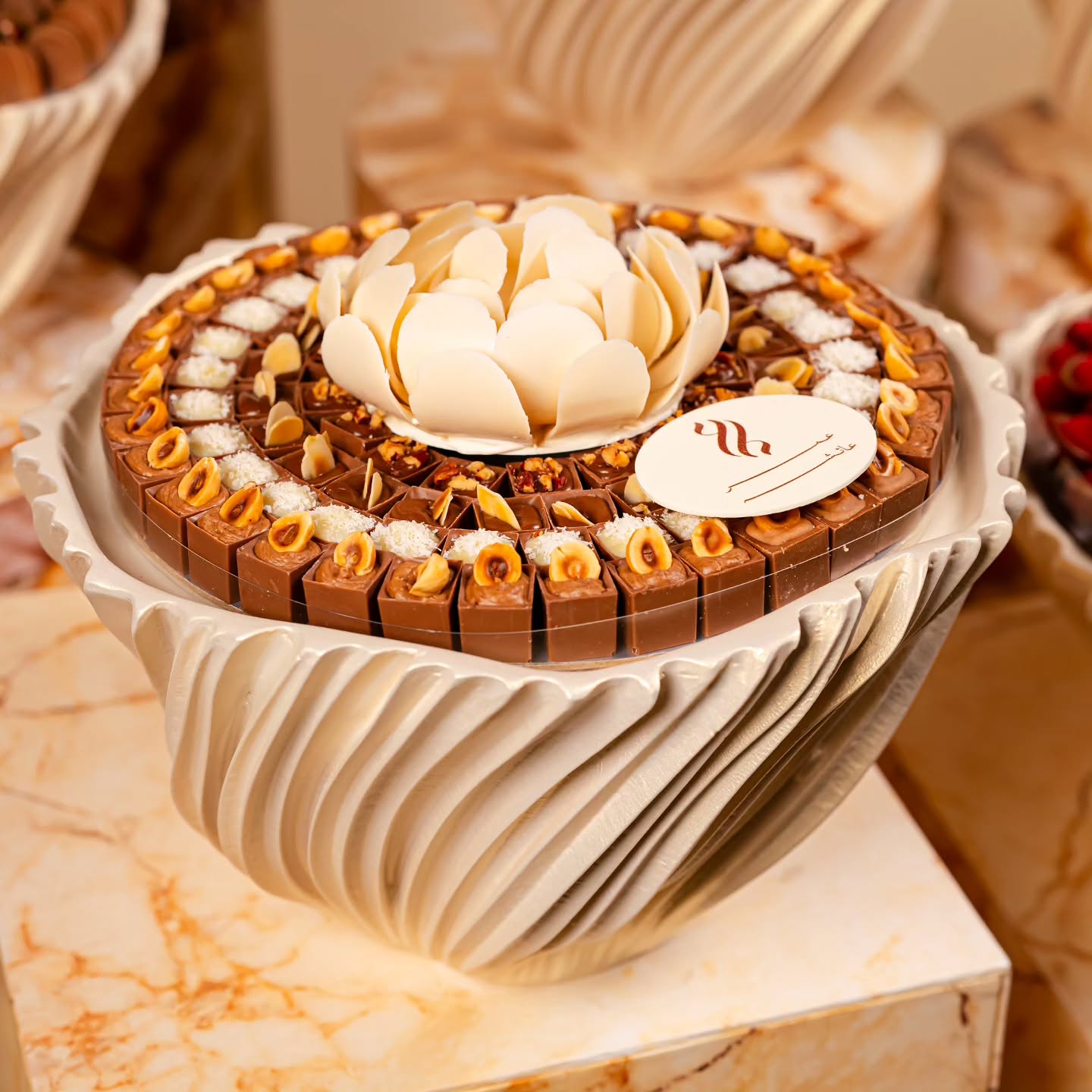 luxurious single-tray wedding display by Fa Le Bon Chocolatier, artfully arranged with handcrafted chocolates, chocolate-covered fresh fruit, cookies, and colorful macarons for elegant celebrations and luxury gifting