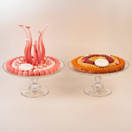Chocolate tray combo UAE with a pink tulip chocolate tray and a colourful cookie tray on crystal stands